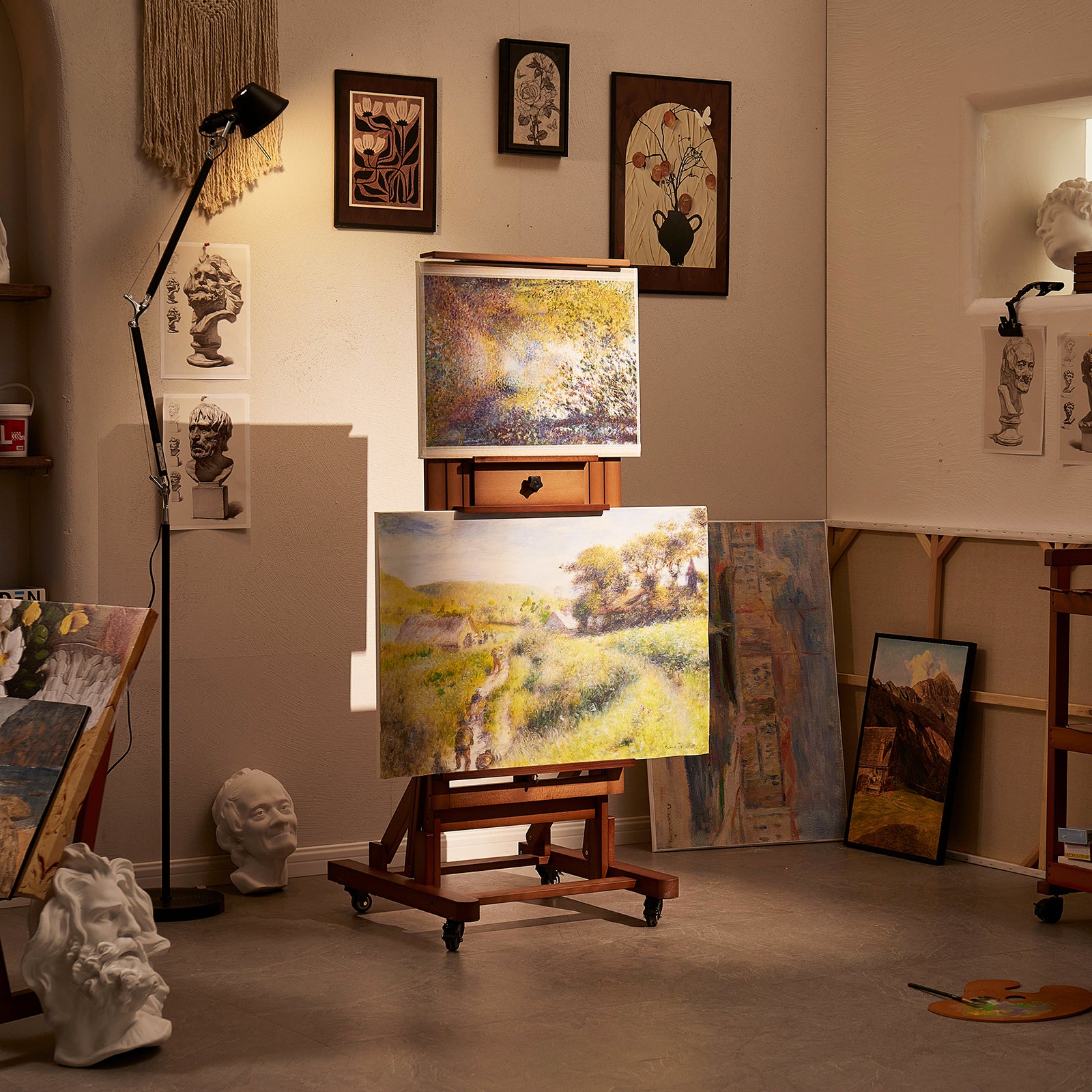 Walnut DHJ-3 easel displaying two paintings in a studio