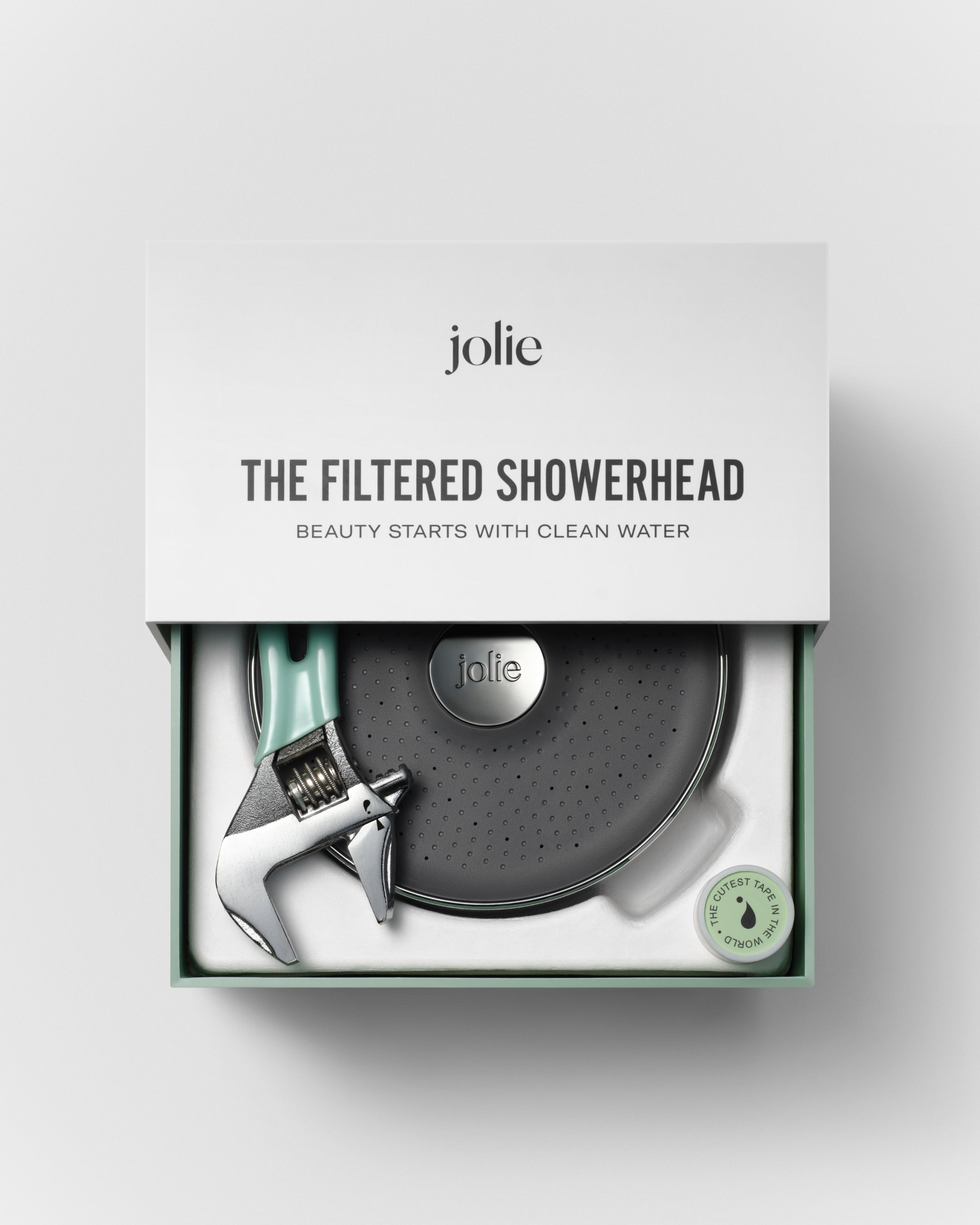 Jolie showerhead and installation tools in their packaging